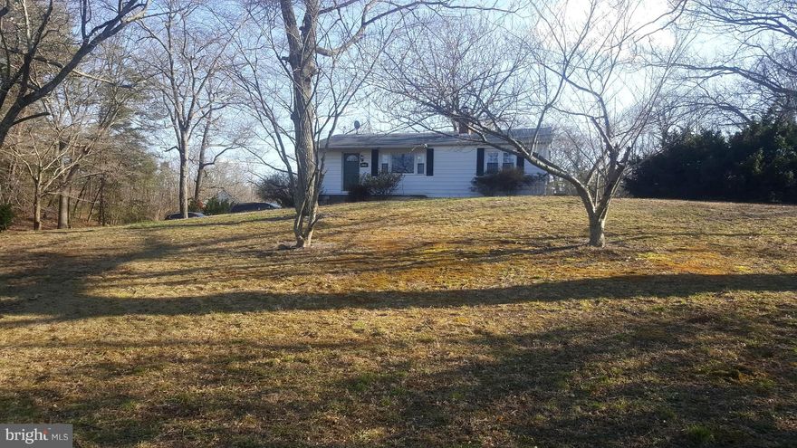 Great Place to Start - 1.3 Acres, 2 Car Detached Garage, No HOA, Updated Kitchen, New Carpet, Hardwood Floors, Living Room with Fireplace, Family Room in Basement, Lg Master with big Bay Window, updated baths, Awesome Deck and Firepit area, perfect for entertaining, newly paved driveway, laundry room with storage, ready to move in,