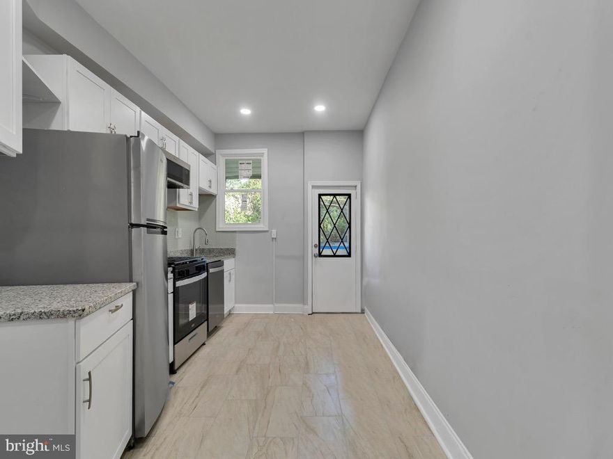 Welcome to 3166 Wilkens Ave, where comfort and convenience meet in perfect harmony. Step onto the inviting porch and enter a home that offers three spacious bedrooms and one-and-a-half bathrooms, all thoughtfully modernized for your utmost comfort.

The heart of this home is undoubtedly its completely renovated kitchen, showcasing brand-new GE stainless steel appliances and a contemporary design that exudes a refreshing vibe. Prepare to be captivated by the sleek finishes and the inviting atmosphere this space provides.

Enhancing your comfort even further is a new HVAC system, ensuring optimal coziness throughout the year. Say goodbye to temperature fluctuations and embrace a consistently comfortable living environment.

This home has been carefully updated with fresh paint, new flooring, and windows, presenting a bright and clean canvas that eagerly awaits your personal touch. The neutral tones create a versatile backdrop for your unique style and décor preferences.

Step outside and discover the fenced backyard, offering the perfect setting for outdoor fun and tranquil afternoons under the sun. Whether you want to relax, entertain, or let your furry friends roam freely, this backyard provides the ideal space for all your outdoor activities.

Location is paramount, and this home exceeds expectations. Situated just minutes away from Ascension Saint Agnes Hospital, Carroll Park and Golf Course, Westside Shopping Center, and Lower Gwynn Falls Park, you'll have everything you need within reach. Additionally, with quick access to I-95, your daily commute will be a breeze, allowing you to spend more time enjoying the comforts of your new home.

Don't miss out on the chance to experience the perfect blend of comfort and convenience at 3166 Wilkens Ave. Seize this opportunity and make this charming gem your new home today.