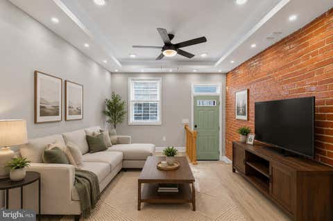 Photo of 703 N Port Street, BALTIMORE, MD 21205 (MLS # MDBA2224928)