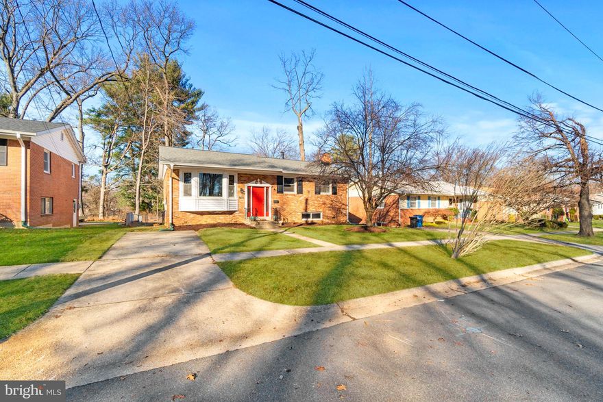 Sited on a private feeling street across from the popular Northwood Chesapeake Bay Trail, this well cared for and meticulously maintained home is  ready for you !  The newer windows throughout the home allow for a natural lited space while the warm refinished original oak hardwoods enhance your personal carpets and furnishings. Enjoy your chef curated meal in the dining or living room prepared in the kitchen with new stainless appliances and nicely custom maple cabinets.  The upper level offers 3 bedrooms and 2 full bathrooms.  The lower level finishes out the home with a bedroom/ workout area, full bathroom, guest half bathroom, family room with newer carpet and fireplace, kitchenette, separate exit,  and laundry/ mechanical/ storage area.  Entertaining friends and family is a pleasure on the rear wood deck and screen porch while the new fence keeps your pets safe.  Blocks to the Kemp Mill Shopping Center, Community pools, and Parks.