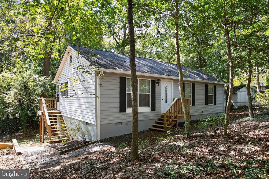 This charming 3-bedroom, 2-bath home is perfect for water lovers! It features durable LVT flooring, plush carpeting in bedrooms, stainless steel appliances, and granite countertops. Situated on one of the larger lots in the neighborhood, it offers plenty of outdoor space. Conveniently located near Solomons Island, Prince Frederick, PAX River, Andrews, and DC, with easy access to Vera's Beach Club and just minutes from Chesapeake Bay and Solomons! This is a Must See!