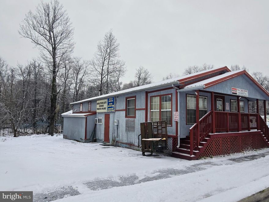 Prime Investment Opportunity on a 10+ Acre Corner Lot! This conveniently located commercial/residential property sits at the corner of E. Harrisburg Pike and Toll House Road, offering excellent visibility and easy access to Route 283. The property includes multiple outbuildings and is currently being utilized as an auto body shop, providing immediate income or business potential.  At the front of the property is a 3-bedroom, 1.5-bath home that is currently tenant-occupied and generating rental income. The rear portion of the property is flat and open, presenting a strong opportunity for future development or expansion.   Property is being sold as-is. All showings must be scheduled during daylight hours with a minimum of 24-hour notice.  Don’t miss this unique opportunity—schedule your private showing today! Londonderry Township is the best point of contact to discuss the permitted uses.