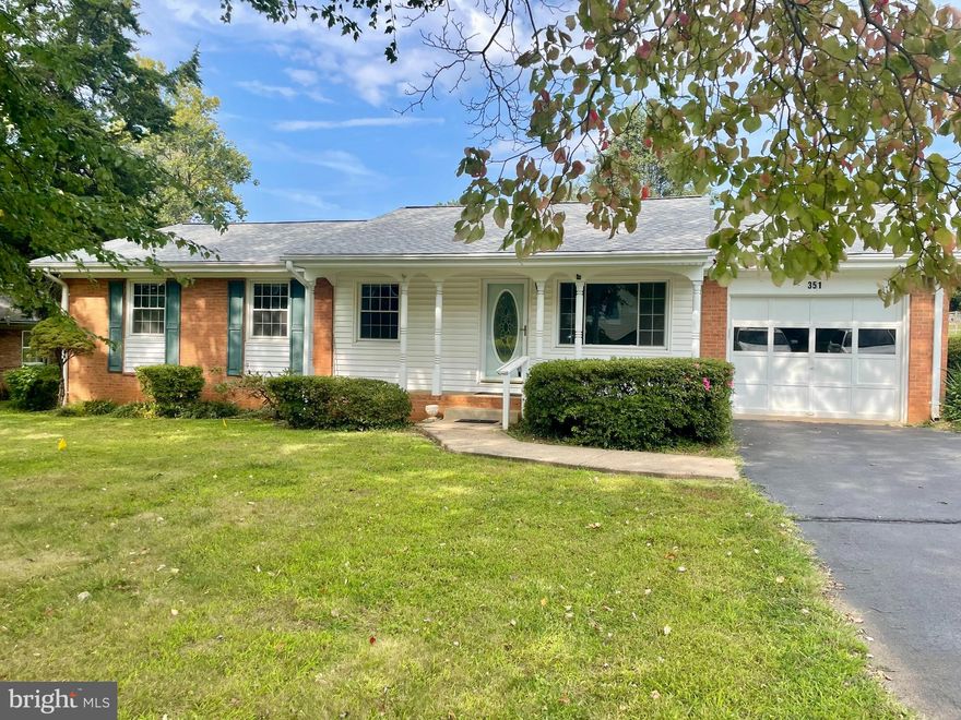 Charming Brick Home in Town. Discover comfort and convenience in the 4 bedroom, 2 bath home within walking distance to the heart of Warrenton. Featuring a welcoming living room with a large picture window that fills the space with natural light, this home offers both warmth and functionality with separate dining room ideal for gatherings, kitchen just off dining area with gas cooktop and built-in oven. Large sunroom perfect for relaxing or entertaining, deck leads to rear yard. Carpet throughout with ceiling fans in all bedrooms. One car garage for secure parking, expansive yard with a handy storage shed. Classic brick exterior for timeless curb appeal. This home blends traditional charm with practical features ready for you to move in and make it your own. Home sold AS IS.