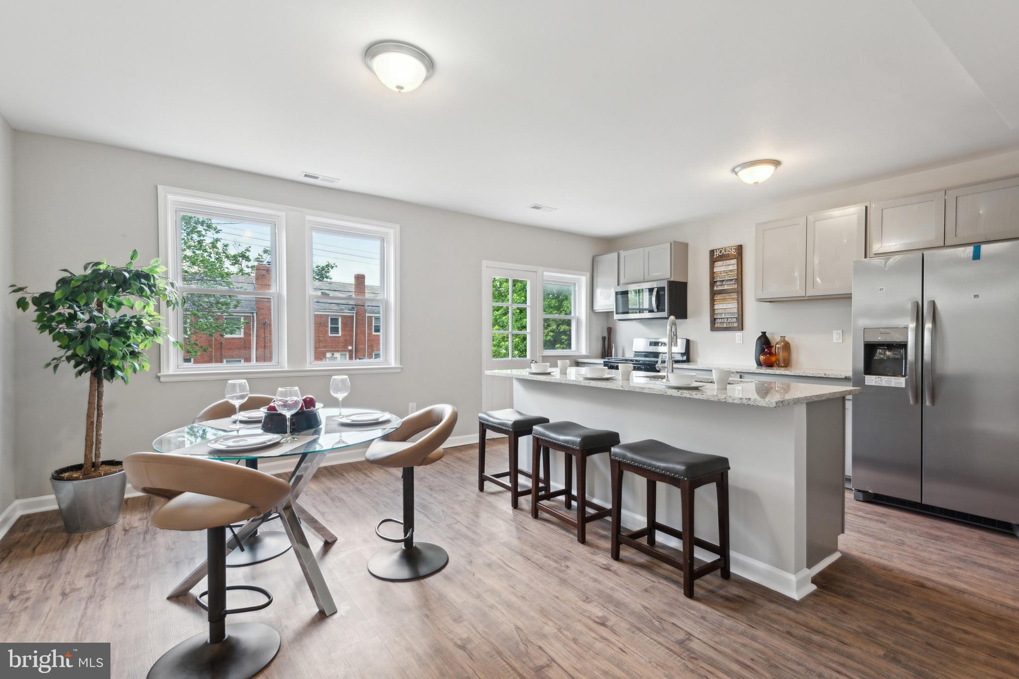 WELCOME HOME! This beautifully FULLY remodeld home in the sought after Baltimore neighborhood will not last long. This home has been completely renovated all the way down to the studs. Walk into the front door to find the natural light gleaming off the new LVP floors and then make your way to the kitchen of your dreams, be sure to check out the wonderful half bath for entertaining guests. Find your way upstairs for 3 generously sized bedrooms and a gorgeous full sized bathroom before making your way to the fully finished basement offering an additional bedroom or office/home gym space with another charming full bathroom. Turn the basement into an apartment rental for extra income! New appliances, new HVAC, new hot water heater...NEW NEW NEW! The detached garage adds wonderful extra storage space. The property is close to Morgan State University along with a range of shopping, dining, and entertainment options, this home will be sure to go fast!