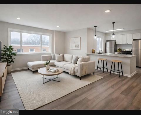 Photo of 49 W Diamond Ave, GAITHERSBURG, MD 20877 (MLS # MDMC2224912)