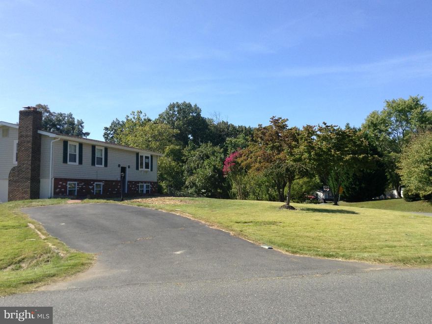 Totally Renovated, All new bath room. New Kitchen, Hardwood on top Floor, Granite Countertops, Ceramic Tiles, New Carpet, New paint, New light and many more updates..4th bedroom can be used as a den. private Fenced rear Yard. This home is located on a quiet neighborhood!!