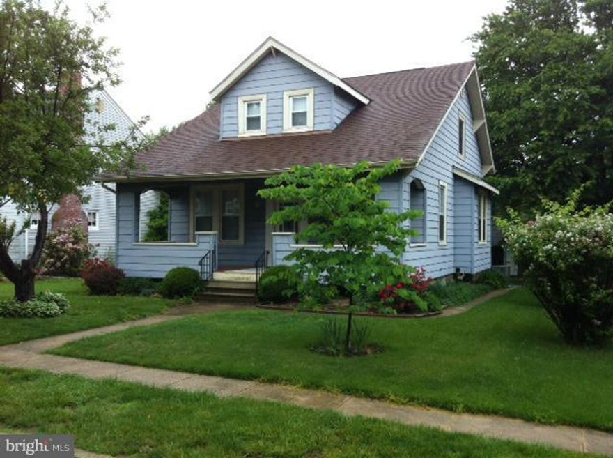 GREAT PRICE ON THIS 4 BEDROOM CAPE COD WITH LARGE, RELAXING FRONT PORCH AND ALLEY ACCESS TO DETACHED GARAGE!!
