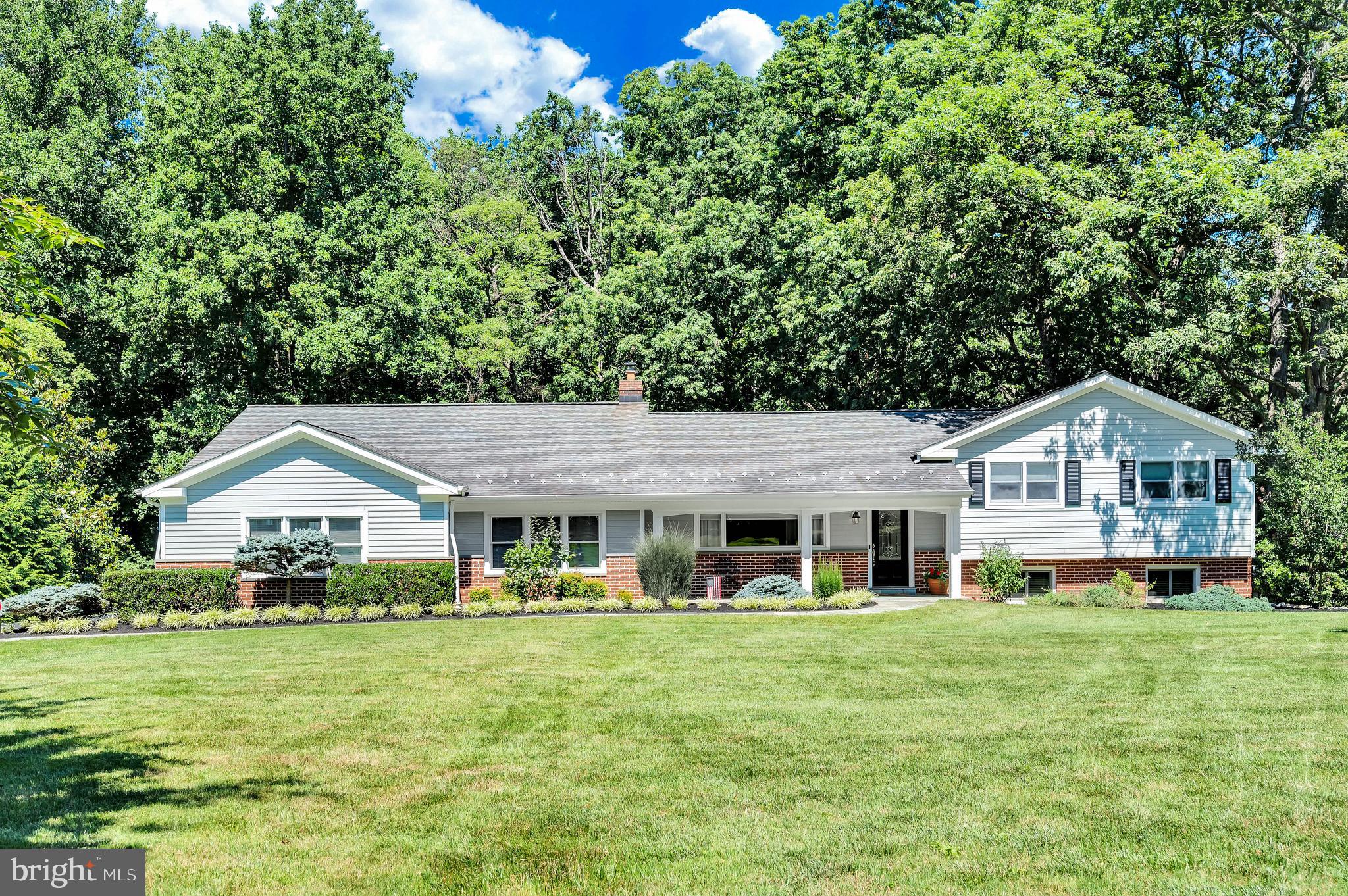 ***DEADLINE for all offers is Wednesday, July 6th at 7pm***Perfectly situated in a quiet western Howard County neighborhood, this flawlessly updated home features a mix of traditional and modern amenities that will make you feel right at home. The main level boasts an open floor plan, including a large kitchen with granite countertops and interior lit kitchen cabinetry, a full sized dining area, a walk-in pantry and mudroom, and a spacious living room with vaulted ceilings and floor to ceiling windows that overlook all the sweet wildlife the woods has to offer. The living room and the lower level entertainment area have been outfitted with high end Bose surround sound and the kitchen, garage and deck feature Bose speakers. Hardwood floors and high end recessed lighting run throughout the entirety of the home, plus an alarm system by Vintage, a radon mitigation system, and a roomy two car garage. The home includes two fireplaces, one wood burning and one propane, as well as a firepit in the backyard. The home is situated on 1 acre of land, which includes a basketball court with a Gorilla brand basketball hoop, a beautiful deck with a gazebo and two covered porches with recessed lighting, as well as a 25 KW generator. All utilities were run underground to maintain the visual appeal of the property and Nest cameras were placed around the exterior of the home (perfect for late night deer spotting!). Excluded from the sale are the glass and chrome bookshelves on the lower level.