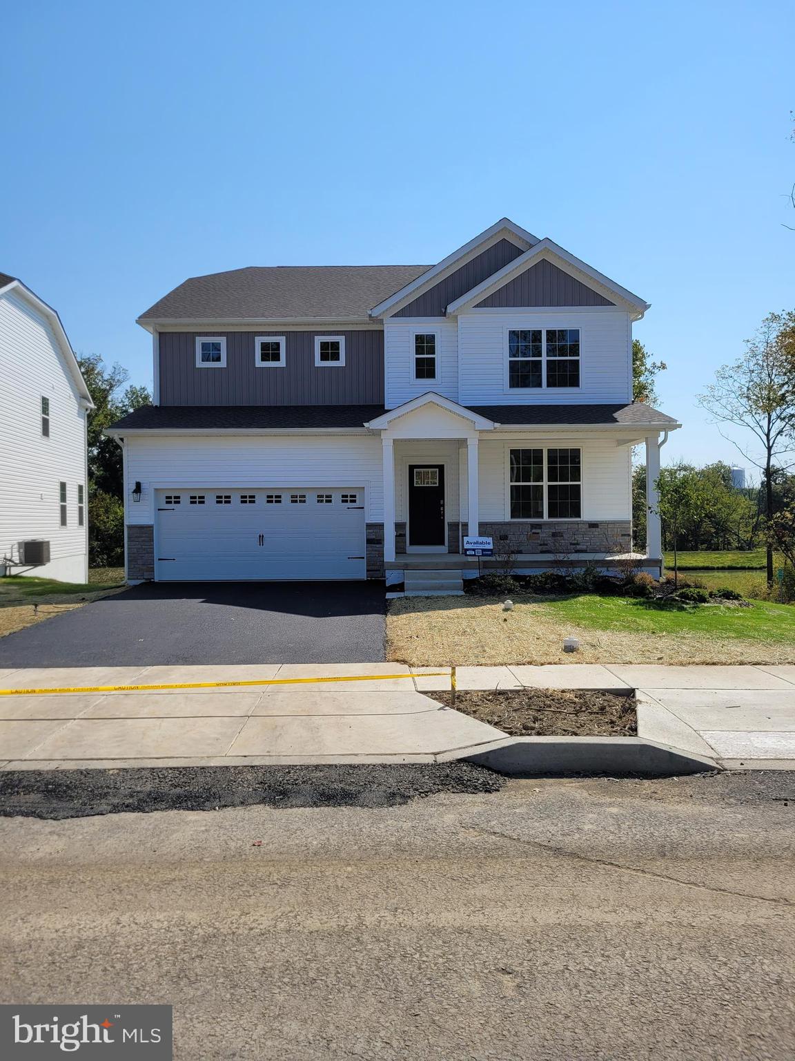 QUICK DELIVERY!! This Hampshire by D.R. Horton is a stunning new construction home plan featuring 3930 square feet of living space, 5 bedrooms, 3 bathrooms, FINISHED BASEMENT, and a 2-car garage. The Hampshire is popular for a reason! As you’re welcomed into the home, you’re greeted by the spacious formal dining room, the perfect space to entertain your guests on those special occasions. The foyer opens up to a much desired, open concept living space highlighted by a roomy kitchen with plenty of counter space and a large, modern island overlooking the casual dining area and living room. Tucked off the living room is a downstairs bedroom and full bath – the perfect guest suite or home office. Upstairs you’ll find an upstairs laundry, and four additional bedrooms, including the owner’s suite, which highlights a cozy sitting area, a huge walk-in closet, and a luxurious bathroom. Sample hours will be Mon-Saturday 10:00 am to 5:00 pm and Sundays 11:00 am to 5:00 pm. Photos are representative and not the actual home. The finish colors in this home may be different. $20,000.00 SELLER CREDIT TOWARDS CLOSING COSTS ON THIS QUICK DELIVERY HOME!!