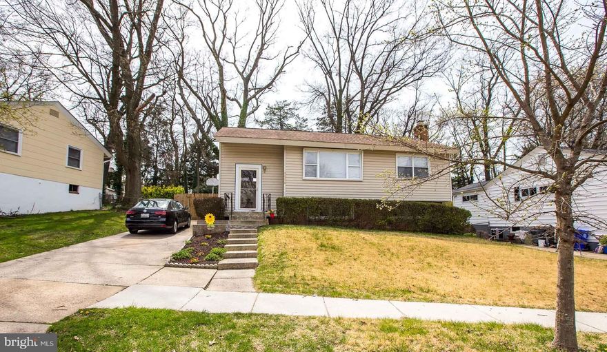 This home has a solid foundation and only three families, including current sellers, have resided here with no renters in between. The interior of this home and maturity of the grounds reflect each owner’s contributions to enhance the much-loved and well-established property.  A brand new roof and a new kitchen floor were installed in Fall 2021!  There is natural light throughout this home, including the finished family room (with walk-in closet) and oversized laundry room on the lower level.  The half-bath has build-out for shower installation.  The gas fireplace is the focal point of the family room.  It is encased in stone and warms the entire family room.  The storage capacity is extremely generous both inside and outside the property, including an attic with a built-in, drop-down ladder; under-stair storage off of the family room, overhead storage in foyer, as well as ample storage under the upper deck.  Yes!  You will have a double deck!  Great for above-ground pool, hot-tub, sun-bathing, etc!  New privacy fence also added to lower deck in 2021.