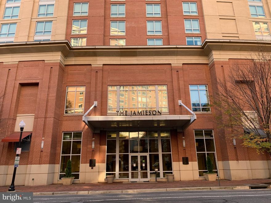 Welcome to this sun-soaked 2 bedroom, 2 bathroom CORNER unit with private parking garage space. Captivating floor-to-ceiling windows overlook Jamieson Ave, the Federal Courthouse, and fill the rooms with natural light - no more vitamin D deficiency. Open kitchen features stainless steel appliances, gas range, granite counters, and maple cabinets. Thanks to a breakfast bar in the kitchen, you will be able to enjoy the company of your friends/family while preparing meals. Spacious master bedroom suite featuring a walk-in closet, en-suite master bathroom with a tub, and dual sink maple vanity.  Size of the second bedroom and bathroom will pleasantly surprise you.  In-unit washer/dryer and extra space to set up your home office. Elevator access and underground garage parking included with electric car chargers available. Building amenities include concierge, rooftop deck, and biannual HVAC servicing. The Jamieson Condo residents can use the adjacent Westin Maid Service, Valet Parking, Room Service, and more. Enjoy the perks of the Carlyle Community and Old Town living! Patent & Trademark Office, Whole Foods Market, Dry Cleaning, Starbucks, Dunkin Donuts, farmers markets on Saturdays, yoga studios, gyms, and all of the shopping and dining King Street has to offer are just steps away.  The Jamieson is only blocks from King Street and Eisenhower metro stations, and minutes from Reagan National Airport, Washington DC, and the Pentagon. SECOND PARKING STOP AVAILABLE FOR EXTRA MONTHLY CHARGE.