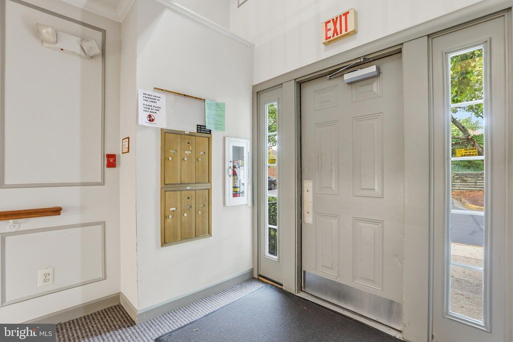 Photo of 20309 Beaconfield Terrace #20309, GERMANTOWN, MD 20874 (MLS # MDMC2205756)