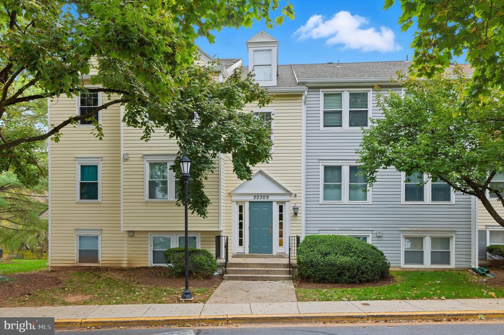 Photo of 20309 Beaconfield Terrace #20309, GERMANTOWN, MD 20874 (MLS # MDMC2205756)