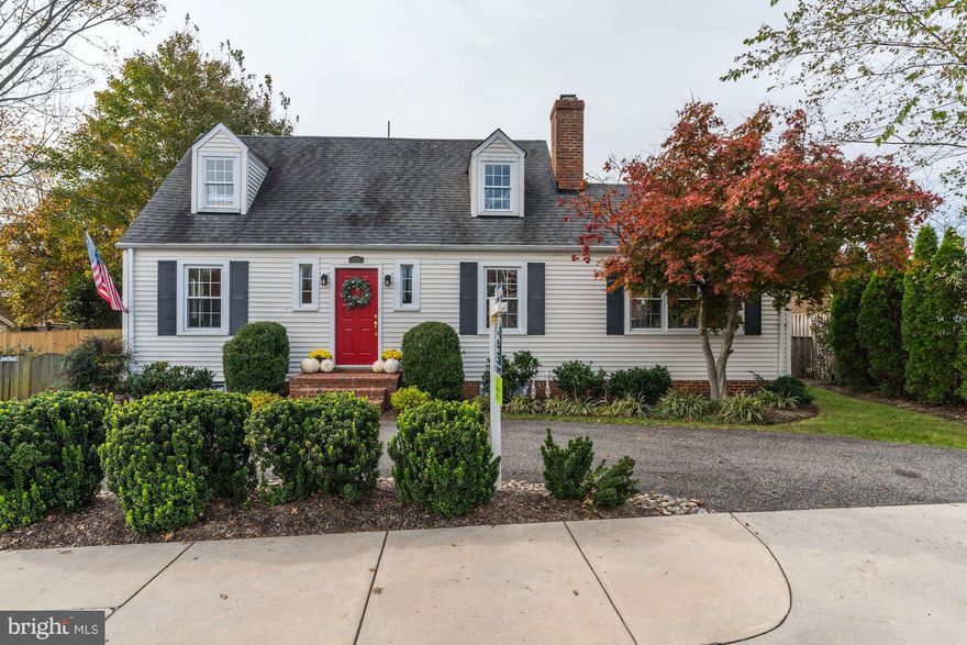 NO OPEN HOUSE JANUARY 20, 2019. PROPERTY UNDER CONTRACT.  Pristine with high end updates, this stunning Cape Cod  features a  gorgeous white kitchen wth granite counter tops and stainless steel appliances and generous adjoining dining room.  The main level offers an elegant living room with warm hardwood floors,  wood burning fireplace and cozy den with cathedral wood ceiling. There is a much sought after main level bedroom and bath for ease of accessibility to the front and back entry. Upstairs are two bedrooms and updated bath. Outdoor entertaining is a breeze with a level lushly landscaped garden, slate patio and rear deck. Walking distance to Starbucks, restaurants, shops.Short commute to Pentagon and DC bridges.