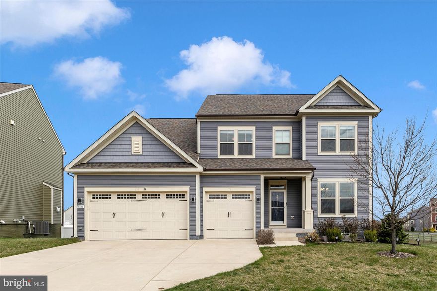 Open Saturday 1:30-3:30 pm. Welcome to this stunning 5 Bedroom/3.5-Bath, 3 Car Garage Craftsman Colonial, offering over 4,000 square feet of beautifully designed living space on a premium corner lot with views of a tranquil pond and natural surroundings. This SMART HOME is equipped for modern living, featuring integrated technology for lighting, sound, security, and temperature control—designed to make daily life seamless and connected.
Step inside to an airy, open-concept main level showcasing an elegant, modern granite/stainless kitchen with premium finishes, designer lighting, and a large island perfect for entertaining. The kitchen flows effortlessly into a bright family room, while at the front of the home, a formal living room offers additional space for relaxation or gatherings. A dedicated office or flex space and a powder room on the main level provide an ideal setup for remote work or study. Upstairs, you’ll find a luxurious primary en suite with exceptional closet space, four spacious bedrooms with walk-in closets, a hall bath, and a convenient laundry room. Throughout the home, you’ll enjoy LVP flooring, plush carpeting, and custom fixtures that balance style and comfort.
The fully finished walk-out lower level expands your living options with a large family room, guest suite, a full bath, and generous storage areas—ideal for multi-generational living or an in-law retreat.
A three-car garage offers convenience and space for vehicles, hobbies, or extra storage. With its thoughtful design, smart technology, and peaceful setting, this property is a rare find blending modern functionality and timeless Craftsman charm.