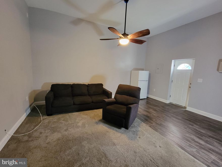 Cozy 1 bedroom apartment.  It is available now.  The rent includes electric, water, septic and trash.  Tenant would be responsible for Internet/TV.  Open living/kitchen space.  Beautiful bathroom.  Nice quiet location.  There is a queen size bed with some built in drawers that can stay there.  THERE IS NO GARAGE SPACE.  The interior was converted to living space.  Application fee is $50/adult