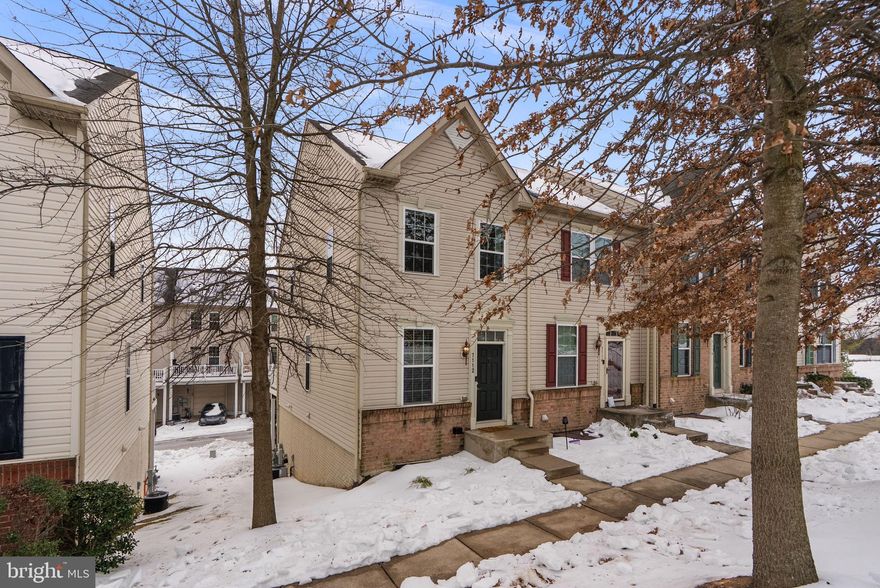 EXCELLENT CONDITION -- END-OF-GROUP -- HIGH CEILINGS -- MOVE-IN READY! Welcome to 7112 Penny Lane; a beautifully maintained, move-in ready home in the heart of Elkridge. Built in 2011 and thoughtfully updated, this home is in excellent condition and has been professionally prepared for market. The open-concept main level features durable LVP flooring, high ceilings, additional windows, abundant natural light, and a seamless flow throughout the high-demand spaces. Three bedrooms w/ three full bathrooms creates an opportunity for investors, buyers who desire roommates, or multi-generational purchasers. **KEY FEATURES & DETAILS** Extra parking pad added for two-car parking in rear of home along with ample guest parking throughout community -- Rear-load garage w/ additional storage space -- End-of-group location -- Composite deck -- Rear entry through garage on lower level & additional main level entry through front door -- Three bedrooms w/ three full bathrooms -- Private ensuite bedroom/bathroom on lower level -- Overhead lighting added in every room on all floors (Jan 2023) -- New tile in all three bathrooms, basement hallway, and basement bedroom (Aug 2023) -- New sump pump (July 2023) -- New carpet (Jan 2026) -- Fresh partial paint (Jan 2026) -- LVP on main level -- Granite counters/stainless steel appliances -- Open concept on main level w/ breakfast area -- Kitchen bar area -- Upper level laundry -- Spacious primary suite w/ dual closets -- Walk-in shower & bathtubs -- Easy to maintain -- Sidewalks and green spaces throughout community -- Neighborhood playground -- Easy access to commuter routes, shopping, and dining. This home presents a rare opportunity to simply move-in, unpack, and enjoy right away.