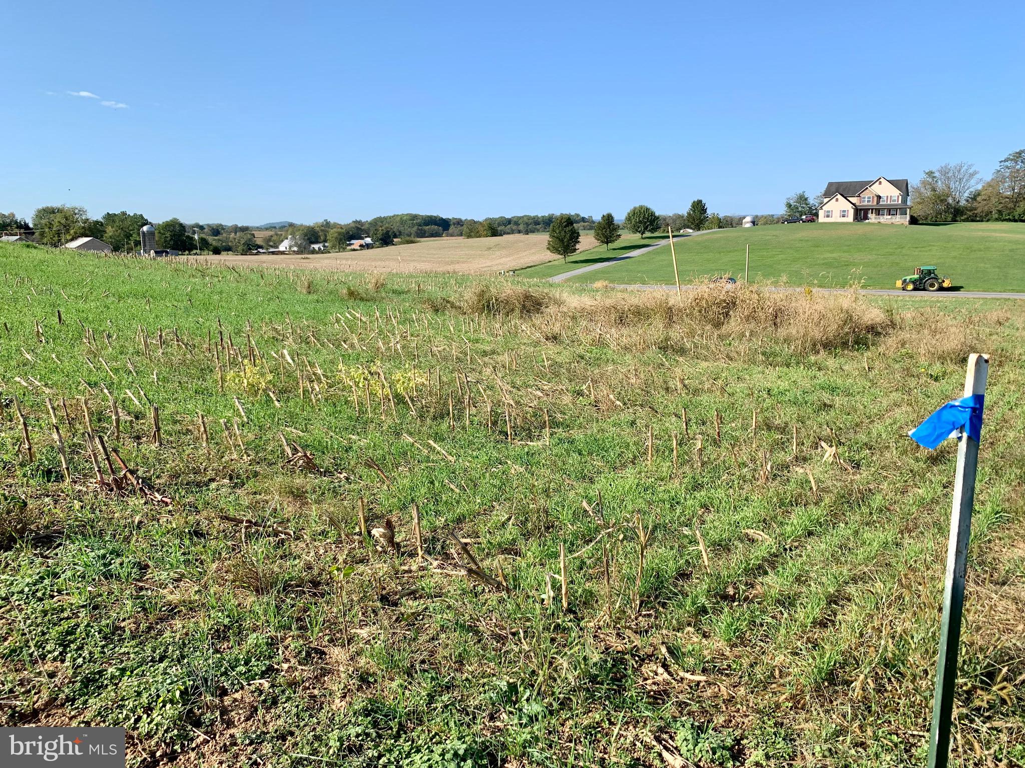 Wow.... if you're looking for the perfect building lot within 5 min of I-70 and 360 views, this is it!!! Faces West for beautiful sunsets! Rear of property faces East for beautiful sunrises!!!! WELL ALREADY DRILLED!! (650 ft w/30 gpm rate), perc approved for septic - confirmation from Washington County Health Dept in online docs, Gently sloped allows for walk-out basement scenario and great drainage! Ready for your ultimate custom home! High end quality homes surround! Bring your own builder! Please review Plat notes regarding septic reserve area, BRL and driveway location among other info. Plat #9992 online at mdlandrec.net for clearer image - copy also uploaded to listing documents along with Well & Perc documents. Note conservation area behind lot restricting future development !!