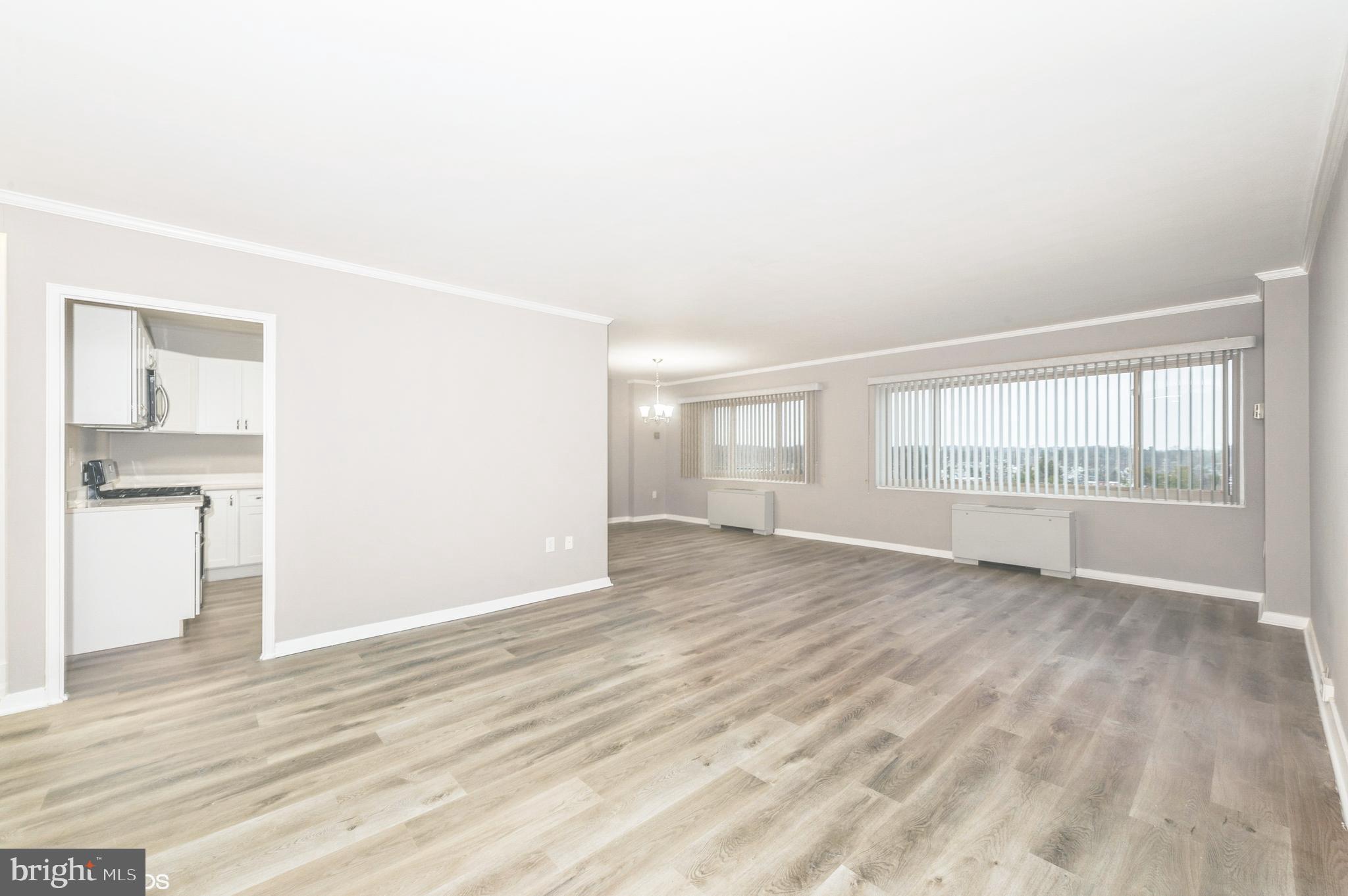 MOVE RIGHT INTO THIS BEAUTIFULLY RENOVATED 2BR/2BA PENTHOUSE LEVEL UNIT. BRIGHT & SPACIOUS LIVING ROOM & DINING ROOM. BRAND NEW KITCHEN WITH QUARTZ COUNTERS & STAINLESS APPLIANCES. THE PRIMARY BEDROOM SUITE HAS A WALK-IN CLOSET WITH WASHER / DRYER AND BATH. GENEROUS-SIZED SECOND BEDROOM. NEW FLOORING, RENOVATED BATHS & FRESHLY PAINTED THROUGHOUT! LUXURY FULL SERVICE BUILDING. GARAGE PARKING SPACE INCLUDED (P12).
