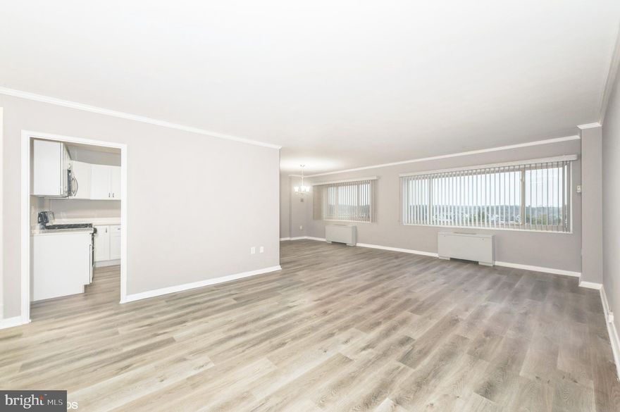 MOVE RIGHT INTO THIS BEAUTIFULLY RENOVATED 2BR/2BA PENTHOUSE LEVEL UNIT.  BRIGHT & SPACIOUS LIVING ROOM & DINING ROOM.  BRAND NEW KITCHEN WITH QUARTZ COUNTERS & STAINLESS APPLIANCES.  THE PRIMARY BEDROOM SUITE HAS A WALK-IN CLOSET WITH WASHER / DRYER AND BATH.  GENEROUS-SIZED SECOND BEDROOM.  NEW FLOORING, RENOVATED BATHS & FRESHLY PAINTED THROUGHOUT!  LUXURY FULL SERVICE BUILDING.  GARAGE PARKING SPACE INCLUDED (P12).