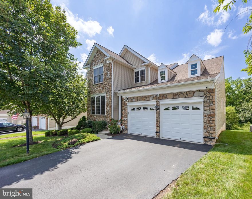 Welcome to easy, elegant living in the highly sought-after Regency at Providence—an exclusive active adult community for ages 55+. This beautifully maintained 3-bedroom, 3-bathroom home offers the perfect blend of comfort, space, and resort-style amenities. The main level features hardwood floors that flow throughout the main living areas, leading into a dramatic 2-story family room that fills with natural light. The spacious Primary Bedroom Suite complete with a walk-in closet on the main level provides privacy and convenience. Enjoy peaceful views from the deck overlooking a serene wooded area, perfect for morning coffee or evening relaxation. Upstairs, you'll find two generously sized bedrooms, two full baths, and a large open loft—ideal for a home office, den, or guest retreat. Additional highlights include a 2-car garage and an unfinished walk-out basement with endless potential. Enjoy the best of community living with access to top-notch amenities: indoor and outdoor swimming pools, a state-of-the-art fitness center, tennis and pickleball courts, and a beautifully appointed clubhouse with a library and social spaces. Don't miss your chance to own this exceptional home in one of the area's most vibrant and active 55+ communities. Seller already had the home pre inspected by Spotlight Home Inspection and the report is available upon request.  Attend an Open House or schedule a private tour today!