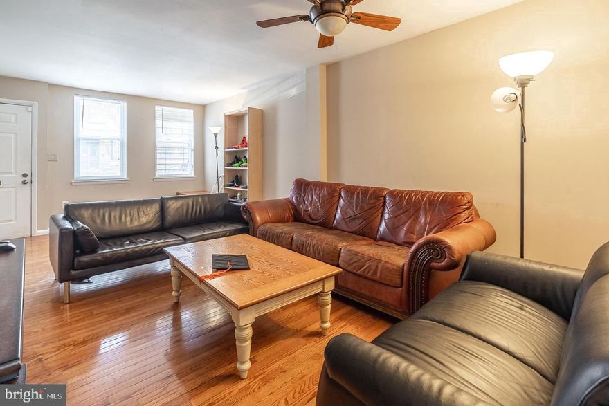 2-CAR PARKING home in the heart of Temple University! Sun-soaked 4 bedroom, 2 full bathroom rowhome in a convenient location.  Spacious open floor plan, open living room with a coat closet and dining room.  Hardwood floors throughout, large kitchen with  plenty of counter space cabinet space, kitchen leads to a rear private, fenced-in yard, perfect for a table and chairs to enjoy and for summer BBQ. The 2nd floors have 2 large bedrooms and a full bath with a washer and dryer.  The 3rd floor you will find 2 more larger bedrooms and another full bath. Plenty of storage space is in the basement. The 2 private parking spaces are in the rear. Restaurants, shopping, cafes, and banks are nearby. Photos are from a previous listing.