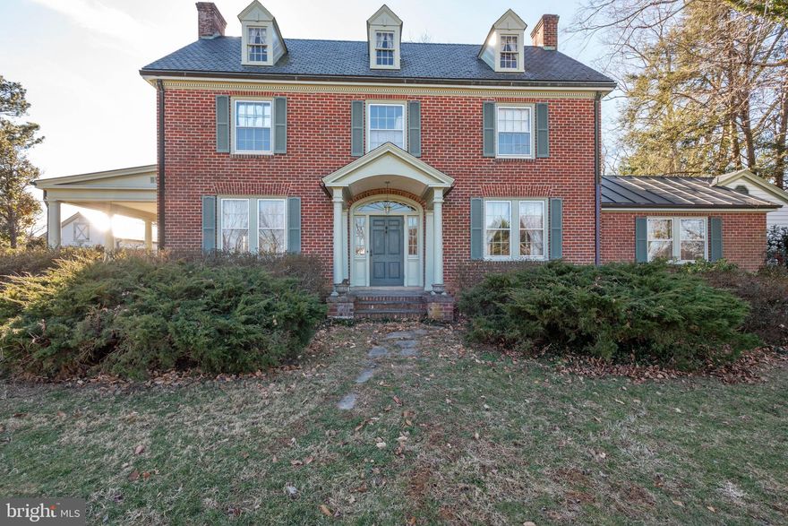 Create new memories in this charming, full of character Colonial style home. Foyer welcomes you in and opens to a formal dining room to the right and large living room with fireplace to the left and a cozy family room beyond. Continue straight to the custom kitchen with granite counter tops. Off the the right of the kitchen is the master bedroom with a  4 season sunroom to enjoy your morning coffee. Master bath was recently updated and features a heated tile floor. Second floor offers 3 additional bedrooms and one full bath. Partially finished attic could be a play room or great as craft room. Over 3,300 square feet of old world charm to proudly to call home. 28x28 and 15x30 detached garage/workshop. Beautifully maintained grounds include boxwoods, azaleas, various fruit trees and fish pond. Owners take great pride in their property and it shows