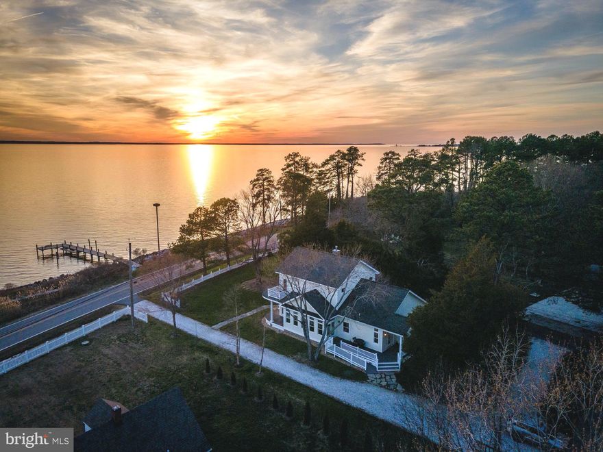 What better way to start your day than morning views of the Potomac!  Boaters, birders, runners, bikers, artists and more will delight in this custom remodel/addition completed in 2009.  Open floor plan with tons of natural light, 10’ ceilings, Anderson transom windows & doors.  Sunroom/morning room, Kitchen with large breakfast bar opens to the main living areas.  Stone fireplace in Great Room.  Potomac River views from most rooms and screened porch.  Side wrap around deck great for grilling.  Perfect open floor plan for entertaining.  Main level guest room and private bath.  Additional bedroom currently used as an office with custom built Murphy bed and French doors to screened porch.  Second level features a master suite with wide open views of the Potomac and Osprey nest (shared by an occasional Eagle).  French door to upper level balcony.  Custom bathroom with double sinks, vanity, tiled shower.  Geothermal dual zone HVAC, Hunter Douglas custom blinds, custom curtains.  Detached garage with workspace and storage area.  Partially fenced yard.  Pier has 1 slip.  Daily sunsets on the Potomac are every photographer’s dream!