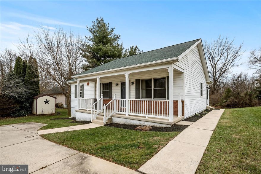 Discover the comfort of one-level living in this exceptionally well-kept home in Charles Town, WV.  This home offers a welcoming living room that opens seamlessly into a spacious dining area and kitchen, with a conveniently located laundry room. There are three generous bedrooms with recently expanded closets and two full baths. Enjoy durable tile flooring in the kitchen, bathrooms, and laundry room, with stylish Engineered Hardwood flooring throughout for a modern, cohesive feel.  The property features a large covered front porch perfect for relaxing mornings or quiet evenings, ample parking, and mature landscaping that creates a peaceful, private atmosphere while remaining close to everything you need.
Ideally situated for commuters, this home provides easy access to the 340/9 Corridor, making travel in any direction a breeze.