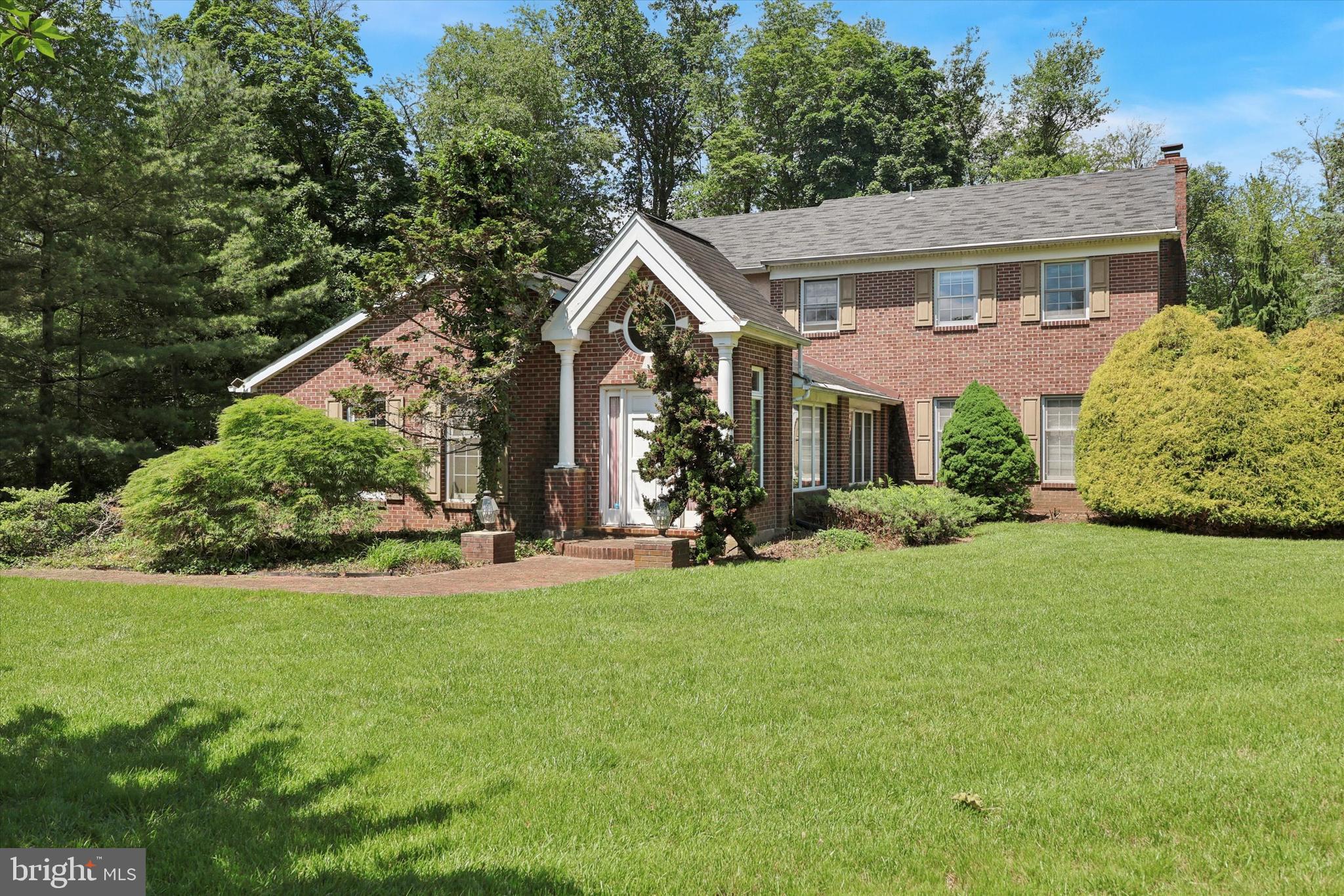 Welcome to your dream home in the heart of Maple Glen, located in the highly sought-after Upper Dublin School District and just steps from Maple Glen Elementary! This beautifully maintained 4-bedroom, 2.5-bath home offers over 3,200 square feet of comfortable living space, including a finished basement and a sun-drenched sunroom—perfect for everyday living and entertaining alike. Step through the front door into a bright and welcoming foyer with vaulted ceilings, gleaming hardwood floors, and abundant natural light. To your right, the spacious living room offers a cozy spot to relax, while the elegant dining room to the left provides the perfect backdrop for hosting dinners, with a lovely view of the side yard.
The eat-in kitchen is the heart of the home, featuring granite countertops, stainless steel appliances, ample cabinetry, and a layout designed for both function and style. Just off the kitchen is the warm and inviting family room, highlighted by custom built-in shelving and a charming wood-burning fireplace. From here, step into the sunroom—an ideal spot to enjoy your morning coffee bathed in sunlight. Upstairs, the primary suite offers a peaceful retreat with a walk-in closet, dressing vanity, and a private ensuite bath with a shower stall. Down the hall are three generously sized bedrooms, a hall bath, and the convenience of an upstairs washer and dryer. Need more storage? A pull-down attic provides easy access to additional space. The fully finished basement adds even more versatility—perfect for a game room, home gym, office, or playroom—with a separate utility/storage area offering plenty of shelving.
Outside, enjoy the beautifully landscaped yard, spacious patio ideal for grilling, and plenty of room for gardening, play, or simply relaxing. An expanded driveway and oversized two-car garage provide ample parking and lead directly into the mudroom and side entry with a second utility space. Conveniently located with easy access to Route 309, I-476, I-276, shopping, dining, and local attractions. You're less than a mile from Mondauk Commons Park and just a short drive to downtown Ambler and the SEPTA train station. This move-in-ready home has everything you need—spacious rooms and an unbeatable location. Don’t miss your chance to make it yours. Schedule your showing today and start enjoying summer in your new home!