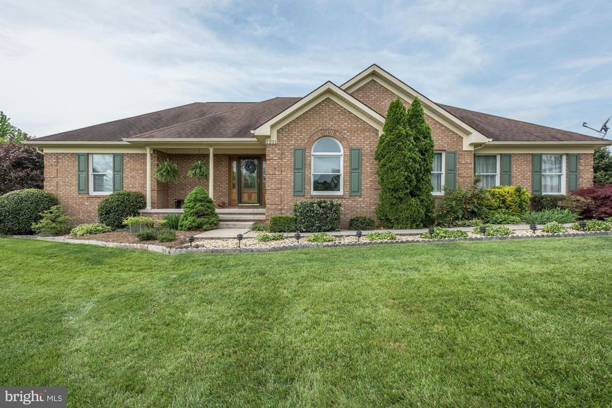 Stunning 3BR 2 Bath Brick Rancher on 1 acre corner lot. Renovated upscale kitchen w/granite countertops, tile backsplash, wall oven, built-in microwave & tile floors. LR w/gas fireplace, FR with stone fireplace & built in cabinetry. Master Suite w/walk in closet and separate shower/soaking tub. Large Trex deck off back to yard w/storage shed. beautifully landscaped. Conveniently located off Rt340.