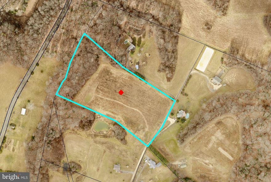 9 .1 acre beautiful, rolling large building lot, less than 1 hour from downtown Washington Dc. and Annapolis. Perked and ready to build your dream home in the country. Large open area to have animals or livestock. Partially wood with a small stream that flows along the property line. Opportunity to create homestead or small farm . Private and quiet area. The lot is surrounded by farmland  and close to Patuxent River Park Natural Areas open to hiking, and fishing.