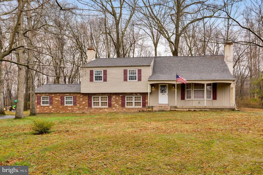 Welcome to the charming neighborhood of Montgomery Woods sitting in the award winning North Penn school district. This lovely, walkable neighborhood boasts large lots, mature trees and accessibility to tons of shops, restaurants, major routes and so much more. This 2500+ square foot home has 4 large bedrooms, 3 full baths, a 2 car garage and charm galore. Having the same owners for the last 46 years, 104 Woodland Dr. has been well loved and cared for. The bones of the house are exceptional, leaving the new owners the availability to use their eye to make the cosmetics exactly as they like. Enter the home off the adorable covered front porch into a large foyer. Here is a coat closet and plenty of space for a bench or getting ready area. This opens up to the kitchen straight ahead, large bright family room to the right and stairs to the 2nd level to the left. The family room has a wood burning fireplace, large bay window looking out to the spacious front yard and plenty of space to do whatever configuration with furniture. This room wraps into the formal dining room and that into the eat in kitchen. The kitchen is a nice size with tons of storage. It's decor will bring you right back to your grandmas cooking. Here you will find a door out to the back patio looking out over the private backyard that backs to woods and has the sweetest shed, great for storage. All the kitchen appliances have been updated. Heading to the lower level you will find an extra large family room (was being used as a makeshift bedroom). This room has so much space you could even make it multi-functional! There is a large closet, plenty of natural light, beautiful wall to wall built-ins with a wood burning fireplace central on the back wall, and new luxury vinyl flooring. This room can also be accessed from the back door foyer that brings you in from the driveway and rear 2 car garage. Finishing out this level tucked away are a full bathroom with a stall shower and a nice size laundry room. Heading upstairs the 2nd level of the home off the main foyer you will find 3 bedrooms, a full hall bathroom and stairs to the upper level bedroom. The primary bedroom has a small walk in closet as well as the sweetest ensuite. The 2nd and 3rd bedroom are ample size with good natural light. The 4th bedroom in the upper level is very spacious and light pours into this room. Its a nice little getaway area, could be a home office or even a great playroom. From here there is access to the storage area in the attic as well. All of the old carpets from the home have been removed exposing the hardwoods that run throughout 80% of the home. They can easily be refinished to refresh their beauty! The yard is perfect for the family to create countless memories and welcome neighborhood friends! Make this home your own room by room. Remember you can change the finishes but you cant change the location!! Location, location, location!! Schedule your tour today! Welcome home!!