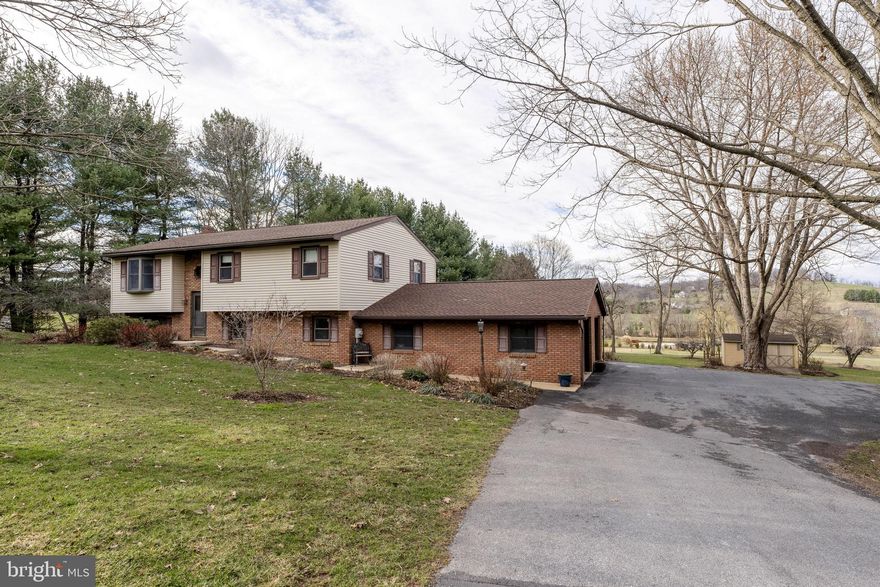 AUCTION PROPERTY.  AUCTION DATE- SATURDAY, June 13th @ 10AM.   Listed price is opening bid price only and is not indicative of the final sale price. Property must go to auction. TERMS:  10% down day of auction, balance 60 days or before.  Buyer pays both transfer taxes (2% of sale price).  REAL ESTATE: Rural one owner split foyer w/1903 SF finished area, eat-in kitchen w/raised oak cabinets & updated appliances, sliding door to covered screen deck/porch, living room, 3 bedrooms, 1 ½ baths, family room w/Harman coal stove, bonus/rec room, laundry, utility room, electric baseboard heat, coal stove, central AC, attached brick 2 car garage 26x28, low maintenance exterior w/covered soffit, fascia & Harvey insulated/tilt windows all on country 3.3 ACRE lot w/garden, lawn, fruit trees, future pasture area & utility building 263’ frontage on Horse Happy Rd.  Ideal rural acreage property.  ZONED AG.  NOTE: After 42 years, owners downsizing & serious to sell.  Elco schools.  Ideal location.  Minutes to Kleinfeltersville, Cocalico, Schaefferstown & Middle Creek Wildlife area.  A must see property to appreciate. OPEN HOUSE DATES: Saturday, May 23, 30 & June 6 from 1 to 4PM.