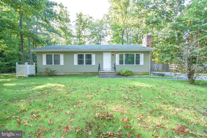 Rambler with massive screened-in porch! 3 bedroom 1 full bath home with oversized driveway that paves the way to beautiful landscaping ranging to the front door. Upon entering the home, a bright white fireplace paired with a wood mantle welcome you into the living room. Through the living room, is the dining room and kitchen which features updated stainless-steel appliances, ample storage, and a peninsula for additional seating. Alongside the kitchen, are glass sliders that lead to the broad screened-in porch, perfect for unwinding or entertaining! Outside is a large fenced backyard and shed equipped with a workbench & shelving for plenty of storage. Enjoy a beautiful home with all the essentials and nuances of leisure!