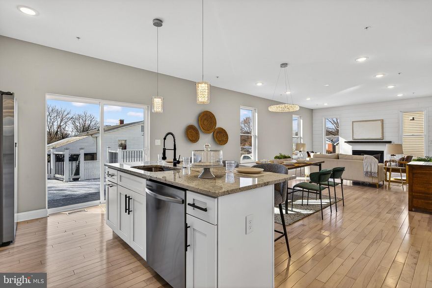 A stunning meticulously maintained by its original owner, this home offers the rare opportunity to be only the second owner. Newly constructed, this impressive two-story home features 4 bedrooms, 3.5 bathrooms and a double car garage, The spacious open concept living areas designed for both comfort and entertaining. Step inside from the inviting porch to a bright interior showcasing neutral tones, high ceilings, recessed lighting, and beautiful hardwood flooring throughout the main level, with 2 living rooms, powder. sun filled living and family areas flow effortlessly into the dining space with glass sliding doors, perfect for indoor-outdoor living. The gourmet kitchen boasts stainless steel appliances, white cabinetry, quartz countertops, and a nice kitchen island. Upstairs, enjoy four spacious bedrooms with ceiling fans, including a luxurious primary suite with double doors, a tray ceiling, walk-in closet, and a spa-like five-piece ensuite. The fully finished walk-out basement with a separate entrance and full bathroom offers exceptional flexibility for a recreation room, guest suite, studio. Step outside to enjoy the beautiful modern deck, ideal for relaxing or entertaining. schedule your showing today before!