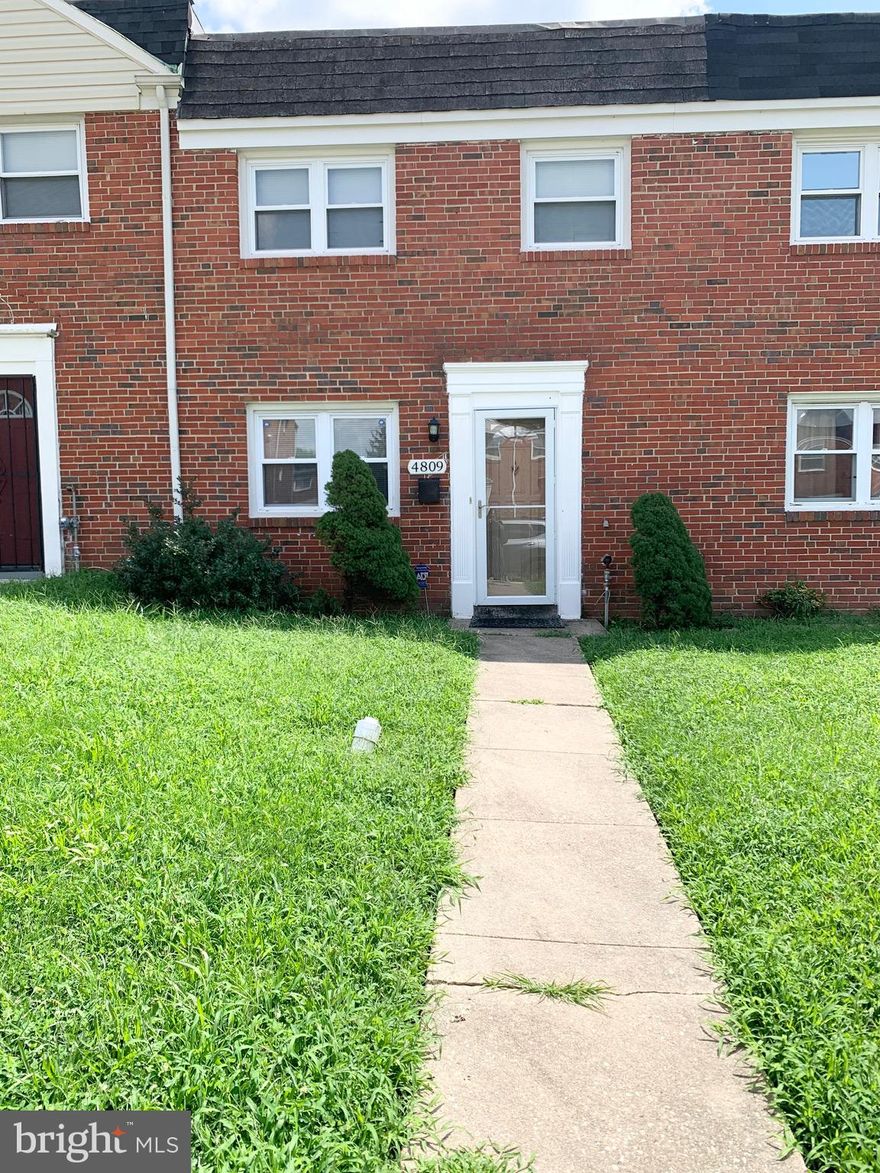 Beautiful 3 bedroom brick row home in the heart of East Baltimore. This lovely home includes a front and rear walk-up for easy accessibility, ceiling fans, central air conditioning and a large fenced backyard with parking pad in the rear. Washer and dryer included, newer carpet, combo eat-in kitchen, spacious separate laundry room on the main level, and a full bathroom with newer vanity.  Convenient access to public transportation, grocery and shops nearby. Schedule your showing today! This one won't last long.