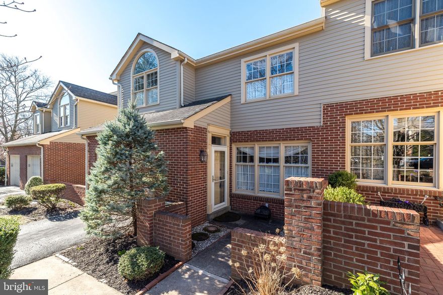 Meticulously maintained 3 Bedroom, 2.5 Bath townhouse located within highly desirable “Gwynedd Hunt,” with excellent location overlooking community open space, within walking distance of Spring House Village Shopping Center including Whole Foods, CVS and Arpeggio’s. The brick and cedar exterior provides a welcoming entrance to this special home. The front door opens to an interior entrance with coat closet, leading to the spacious Living Room with crown molding and recessed lighting. The Kitchen includes a range with 4 gas burners, microwave, sink with garbage disposal, dishwasher, refrigerator and peninsula with breakfast bar offering seating for 4 with pendant lights above. The Kitchen flows seamlessly into the sun-filled Family Room with tiled floor, ceiling fan and gas, brick fireplace, providing the perfect space for entertaining or relaxing. The formal Dining Room with hardwood floor features a French door opening to the expanded wood Deck with retractable awning. The Laundry Room includes the washer and dryer plus a door accessing the 1-Car Garage. A turned, carpeted staircase leads to the 2nd floor. The Main Bedroom is expansive and includes an area with vaulted ceiling, ceiling fan and custom shelving. A Dressing Room, adjacent to the bedroom, offers a walk-in, professionally organized closet plus 2 walls closets and a vanity with porcelain sink, cabinets and seating area. The Main Full Bath with tiled floor includes an additional vanity plus stall shower and whirlpool tub. Bedrooms 2 and 3 each offer ceiling fans and closets, (1 walk-in), and they share the Full Hall Bath with soaking tub and shower. The Basement would be easy to finish and provides daylight windows, an included workbench, cedar closet and 2nd refrigerator. Enjoy walks through the community, or cross the street to shop at the Spring House Shopping Center, or drive only 6 minutes to the town of Ambler with 1st run non-profit movie theater, excellent restaurants and shops. Also close to Trader Joe’s and Costco. This community is located within highly rated Wissahickon District and has easy access to major routes including 309 and the PA Turnpike. Come make this house your home!
