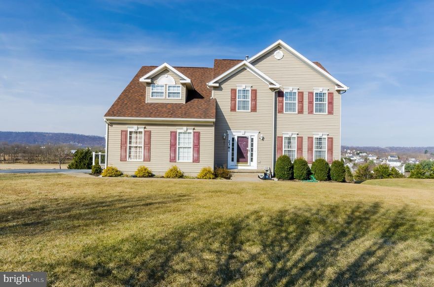 THIS HOME HAS A AUTOMATIC CHAIR THAT COULD BE INSTALLED AGAIN FOR THE EASE OF GOING UP AND DOWN FROM THE IN-LAW'S SUITE. This beautiful home stands amongst beautiful Bradford Pear trees and the view of the mountains.  This must-see residence offers 1.96 acres with beautiful sunsets that are breathtaking.   This residence offers a mother-in-law suite that will help keep your family close. This home calls out to the family with rooms that could keep them close or even private  Comcast for those who need the internet to work from home is also a bonus.  The laundry room is on the main floor and basement, but it also has a location on the upper floor to have a laundry room up with the bedrooms.  While in the kitchen, you can be part of the ones in your family room.  Vinyl blinds in breakfast nook and family room.  The entranceway has hardwood flooring which you could enter in the living room or proceed to the kitchen where the activity is always happening.  The padding of the newer carpet on the stairways and the upper level makes you feel like you are walking on air.  Freshly painted,  brand new decks and walkway leading to the private entrance to the suite in the lower level.  This home could come with some the furnishings if you would desire, some or all.  Each bedroom are spacious.   The Primary has a sitting room or Nursery in it.  The Security System will keep you safe and at peace.   Take advantage of this fantastic opportunity and come for a showing to experience the possibilities that awake you!