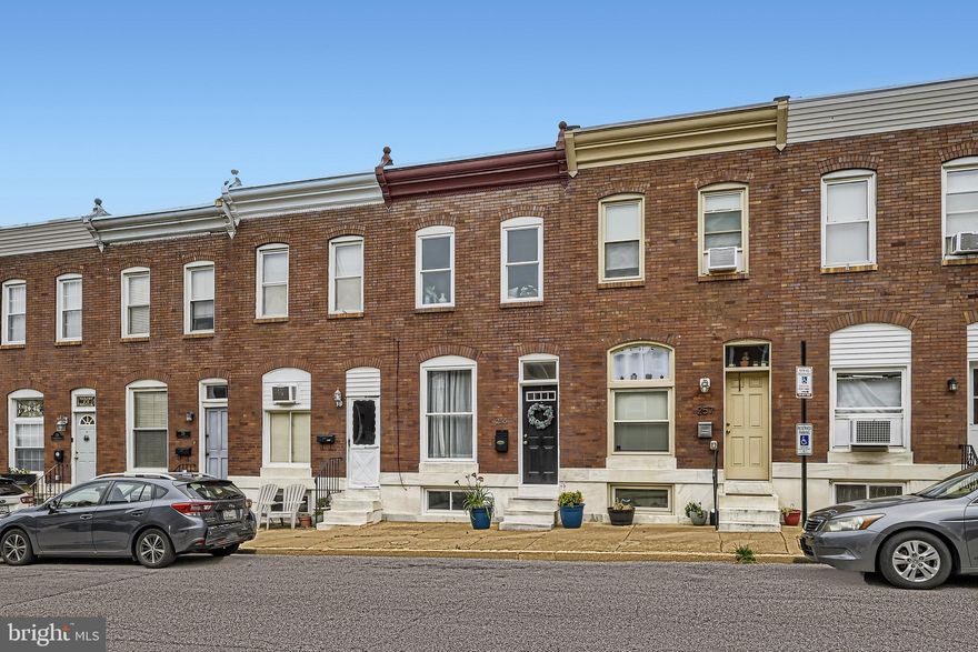 OFFER DEADLINE: 11am SUNDAY, 25 June. Open House 1-3 Saturday.

Welcome home to 255 S Robinson St, a 2 bed, 1.5 bath Patterson Park rowhome with parking!  Walk through the brand new front door into your totally open concept main level space! Plenty of natural light beautifully shines through this lovely home because of the newer double-paned windows throughout, that were installed by Power Home Remodeling 7 years ago with lifetime warranty.  

The kitchen features the following: a sleek barn door pantry for stealth storage, a door to the parking pad replaced 2017, stainless steel appliances, a cozy breakfast bar, inviting French doors welcoming you to hybrid dining/living space, a garbage disposal installed in 2021 and new dishwasher installed in 2021.

The 2nd level includes the following: high ceilings anchored by chic wooden beams in the primary bedroom, the primary bedroom has a spacious walk-in closet, newly updated full bathroom with an illuminating skylight allowing more natural sun to pour between the bedrooms, second bedroom that easily functions as a remote home office, third room that once hosted the laundry that could conveniently convert to another walk in closet or serve as general storage space (or laundry again if you want) and lastly, new carpet installed this month on the bedroom level. 

The lower level, which is an open space that could be another potential TV room area or a gym, hosts new carpet from this summer on the way to the laundry room and the home’s second bathroom. 

The home’s exteriors features a spacious parking pad, which was created in 2018, making urban parking a breeze at any hour. Additionally, the gutters of this rowhome were replaced in 2017. 

In terms of major systems, the hot water heater was replaced in 2023 and a new furnace was purchased in 2018. 

This modern Canton area rowhome with its beloved Baltimore exposed brick and its 8 closets await your private showing today!  See you soon!