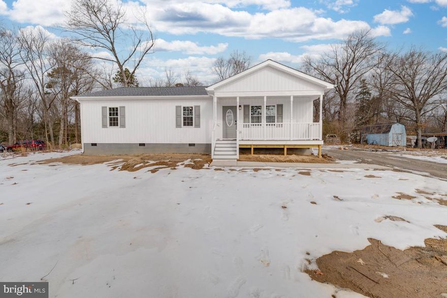 Are you ready to unlock your dream home this holiday season? This stunning, new construction property, slated for completion by late November, offers an impressive array of features, including sleek laminate flooring, ceramic tile, a kitchen island, and a range of modern appliances. Enjoy fresh air on your new composite front porch or entertain your family and friends on your 12 x 12 composite rear deck. The builder is also providing generous closing cost of assistance, making this exceptional opportunity even more attainable. This three bedroom two bathroom ranch style home is situated on a private lot with no HOA.