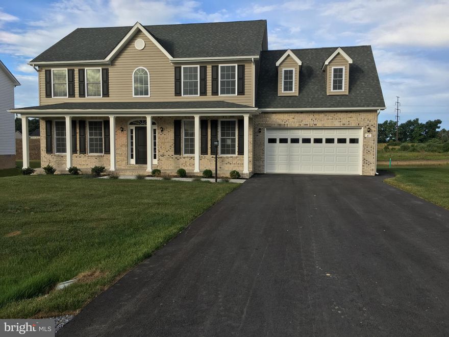Featuring beautiful hardwood floors, oak stairway, granite counter top, crown molding and so much more! This 4 bedroom 2 1/2 bath colonial is located in the well maintained Webber Springs subdivision. New construction and ready to move in!Receive a $2000 credit towards buyer closing costs when they use the preferred lender. A must see!