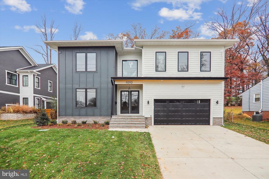 This stunning new construction home at 1010 Cottage St, situated on a generous 0.31-acre lot in Vienna, VA, now finished. Spanning an impressive 5,880 finished square feet spread across three levels, this residence embodies modern luxury.

Upon entering, you'll be greeted by an inviting two-story foyer featuring a stylish accent wall. The main level boasts soaring 10-foot ceilings, providing an open and airy feel. The thoughtfully designed layout connects the living room, dining room, kitchen, and family room, making it perfect for both family living and entertaining guests.

The gourmet kitchen is a chef's dream, equipped with a large center island, abundant counter and cabinet space, and a bright casual dining area. It features state-of-the-art GE-Cafe appliances, combining high performance with aesthetic appeal.

Ascending to the second level, you'll find a spacious owner’s suite complete with a luxurious primary bath. This spa-like retreat includes dual vanities, a free-standing tub, a glass-enclosed shower with a built-in seat, and a private water closet for added convenience. The second level also contains an additional ensuite bedroom, plus two bedrooms that share a well-appointed Jack-and-Jill bathroom. The laundry room is located on this level for connivence. 

The lower level enhances the home’s versatility with a finished bedroom and full bathroom, a flex room ideal for a gym or media space, and a wet bar in the main recreation area, making it a fantastic entertainment spot. A walkup areaway leads to the expansive and beautiful backyard, perfect for outdoor gatherings and relaxation. A 16'X14' deck with composite decking off the breakfast room will be included. 

Overall, 1010 Cottage St offers a unique blend of sophistication, comfort, and functionality—an ideal family home in a desirable location.

Schedule a tour today!