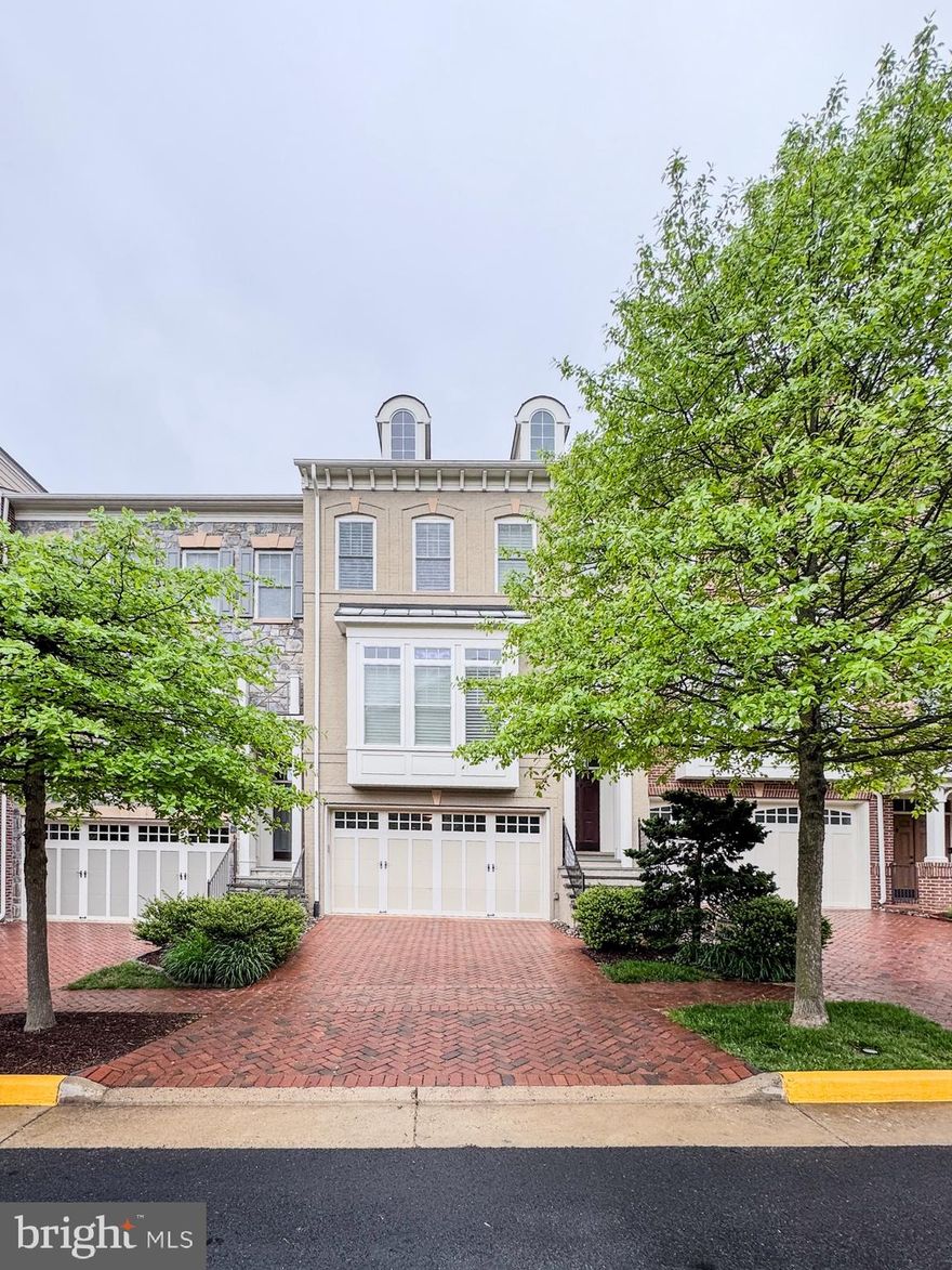 xceptional Townhome in Sought-After Stockwell Manor
Zoned for Haycock, Longfellow, and McLean High School – Top-Tier Fairfax County Schools

Enjoy the perfect blend of luxury, space, and location in this elegant 4-bedroom, 3.5-bath townhome located in the prestigious Stockwell Manor community. With easy access to the West Falls Church Metro Station, commuting to Washington D.C. and beyond is a breeze.

This beautifully maintained home features an open-concept floor plan with 10-foot ceilings and gleaming hardwood floors on the main and upper levels, creating a bright and airy ambiance throughout.

The main level offers a welcoming foyer that leads to a sun-drenched living and dining area, ideal for entertaining. The gourmet kitchen is equipped with stainless steel appliances, ample cabinetry, and a large island, and seamlessly flows into the family room with a cozy gas fireplace and a casual dining area that opens to a private deck — perfect for summer barbecues and outdoor enjoyment.

Upstairs, the spacious Primary Suite boasts a tray ceiling, walk-in closet, and a spa-inspired ensuite bath with dual vanities, an oversized soaking tub, separate glass-enclosed shower, and a private water closet. Two additional bedrooms and a full bath provide plenty of space for family or guests. For added convenience, the laundry area is located on this level.

The lower level features a generously sized recreation room and a bedroom, a full bath, and access to a two-car garage. The fenced yard offers additional privacy and room to relax.

Ideally situated just minutes from shopping, dining, and entertainment in downtown Falls Church, McLean, and Tysons Corner. Easy access to I-66, I-495, Route 7, and the Dulles Toll Road ensures seamless connectivity to the entire region.