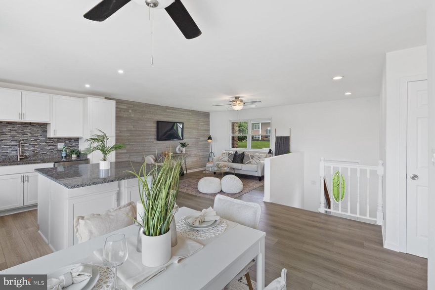 AGENTS - PLEASE VIEW AGENT REMARKS IN BRIGHT MLS. Welcome home to this beautifully updated split-foyer retreat with peaceful water views in a quiet community backing to North Bay Marina. The bright, open-concept main level features a modern kitchen, spacious dining area, and sunlit living room — perfect for everyday living or entertaining guests. Upstairs offers three generous bedrooms, while the finished lower level provides a versatile fourth bedroom or ideal home office with direct access to the attached garage. Step outside to enjoy the brand-new deck overlooking a large, fully fenced backyard — perfect for pets, play, or gardening. Additional highlights include new flooring throughout, a private driveway, and stylish updates from top to bottom. Move-in ready and perfectly located, this home combines modern comfort with a relaxed water-view lifestyle — the total package for your next chapter!

Please schedule all showings online via Showing Time.

Offers may be entered ONLINE through Monday, December 15, 2025 at 4:00 pm.

AT SELLER'S DISCRETION, AN OFFER MAY BE ACCEPTED AT ANY TIME.