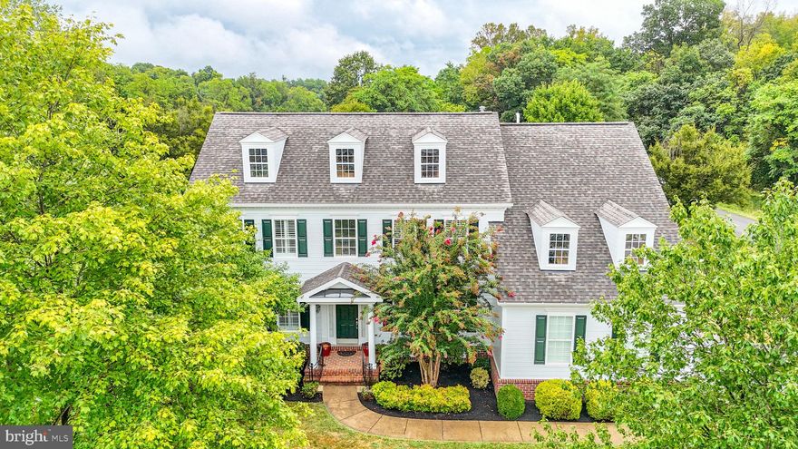 Welcome home to 22 Reachcliff Circle—a meticulously maintained 4-bedroom, 4.5-bath home in the sought-after Fernbank at Cress Creek community in historic Shepherdstown. Situated just minutes from downtown Shepherdstown and Shepherd University, this location offers the perfect balance of peaceful living with easy access to dining, shopping, and cultural experiences.

From the moment you step inside the beautiful open foyer, it’s clear this home has been lovingly cared for and thoughtfully upgraded. The spacious open-concept layout is perfect for both everyday living and entertaining. The heart of the home is the large kitchen, offering ample space for a full dining table, a newly installed kitchen hood, and an easy flow into the living area where a cozy propane gas fireplace creates the perfect gathering space. Large windows throughout flood the home with natural light and provide peaceful views of the beautifully landscaped front and back yards.

Upstairs, you’ll find generously sized bedrooms with large walk-in closets. The primary suite is a true retreat, featuring cathedral ceilings with a ceiling fan, a private sitting room, a spacious full bath, and closets. A dual staircase adds an elegant touch, with a chairlift installed on the right staircase for added accessibility.

The basement is mostly finished, offering additional living space and versatility. Only two rooms remain unfinished, currently being used as oversized storage areas. 

Updates include new LVP flooring and blinds in the basement to help regulate temperature, two upgraded bathrooms upstairs, and fresh paint both inside and out. A brand-new roof was installed in 2021.

The exterior is just as inviting, with a peaceful patio space in the backyard—ideal for relaxing or hosting guests. This home offers the perfect blend of comfort, space, and thoughtful updates in a quiet, desirable neighborhood—just minutes from all that Shepherdstown has to offer.

Don't miss the opportunity to make this warm and welcoming home yours!