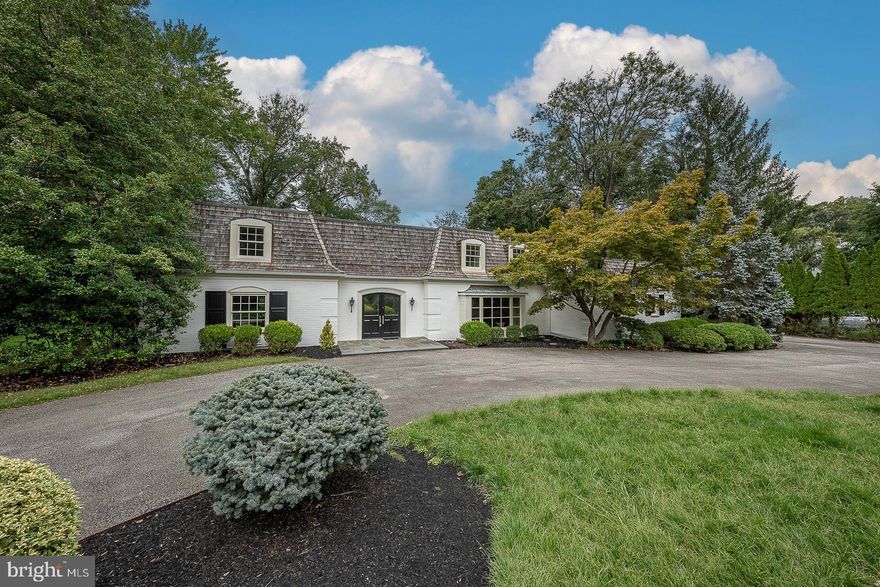 Welcome to 4103 Laurel Dr in Lafayette Hill!  This 5 Bedroom, 3 full, 2 half bathroom, 4910 sq ft, French Colonial has been COMPLETELY RENOVATED and sits on a stunning .74 acre lot. The 2 story entry, flanked by the formal living and dining rooms, welcomes you into the home.  The spacious kitchen with breakfast area offers tons of storage and work space with views of the lovely grounds.  The cozy family room features  a stone accent wall with a fireplace, and sliders to the back patio.  A den/office, laundry room, and 2 half baths complete this level.  Upstairs, the sizeable primary bedroom suite features ample closet space and a full ensuite bath with a double vanity, walk-in shower and soaking tub.  Additionally, there are 4 more bedrooms, one with a full ensuite bathroom and an additional full-hall bathroom.  Enjoy the mature manicured grounds from one of the rear patios.  Located in the Colonial School District.  Close to parks, restaurants, and shopping. Come see this FABULOUS HOME for yourself!