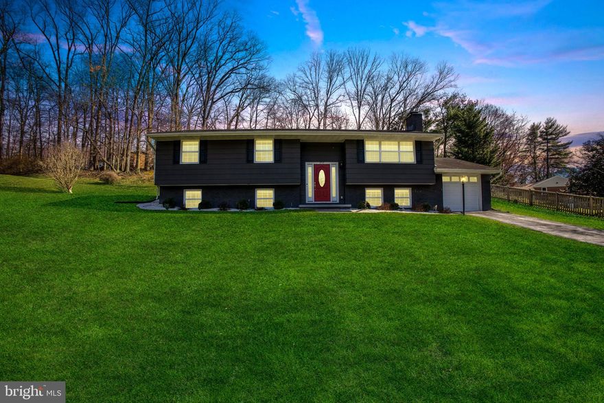 ** MULTIPLE OFFERS RECIEVED.  ** OFFER DEADLINE:  SUNDAY, MARCH 31ST, 2024 @12:00 PM *** Wonderful opportunity to own a move-in ready house in a charming Ellicott City neighborhood! Enjoy over 2,500 square feet of living space, featuring an updated gourmet kitchen with a large island, quartz countertops, breakfast bar, custom 42” cabinets, modern tile backsplash, stainless steel appliances , exhaust hood and pendant lighting.  Take advantage of the open floor plan on the upper level, with refinished hardwood floors, crown molding and recessed lighting.  Cozy up to the wood stove or in the massive lower level family room.  Appreciate the space in the four bedrooms and all three renovated full baths.  Make use of the bonus lower level office room or convenient one car garage.  Live in complete comfort with the whole house dehumidifier.  Have plenty of room for guests to park on your extra long driveway.  Play a little soccer on your enormous front yard.  Relax and unwind in your private backyard, perfect for barbecues or enjoying a quiet evening under the stars.  Close to shops & restaurants with easy access to Rt. 29 and downtown Historic Ellicott City!  Make an appointment now!