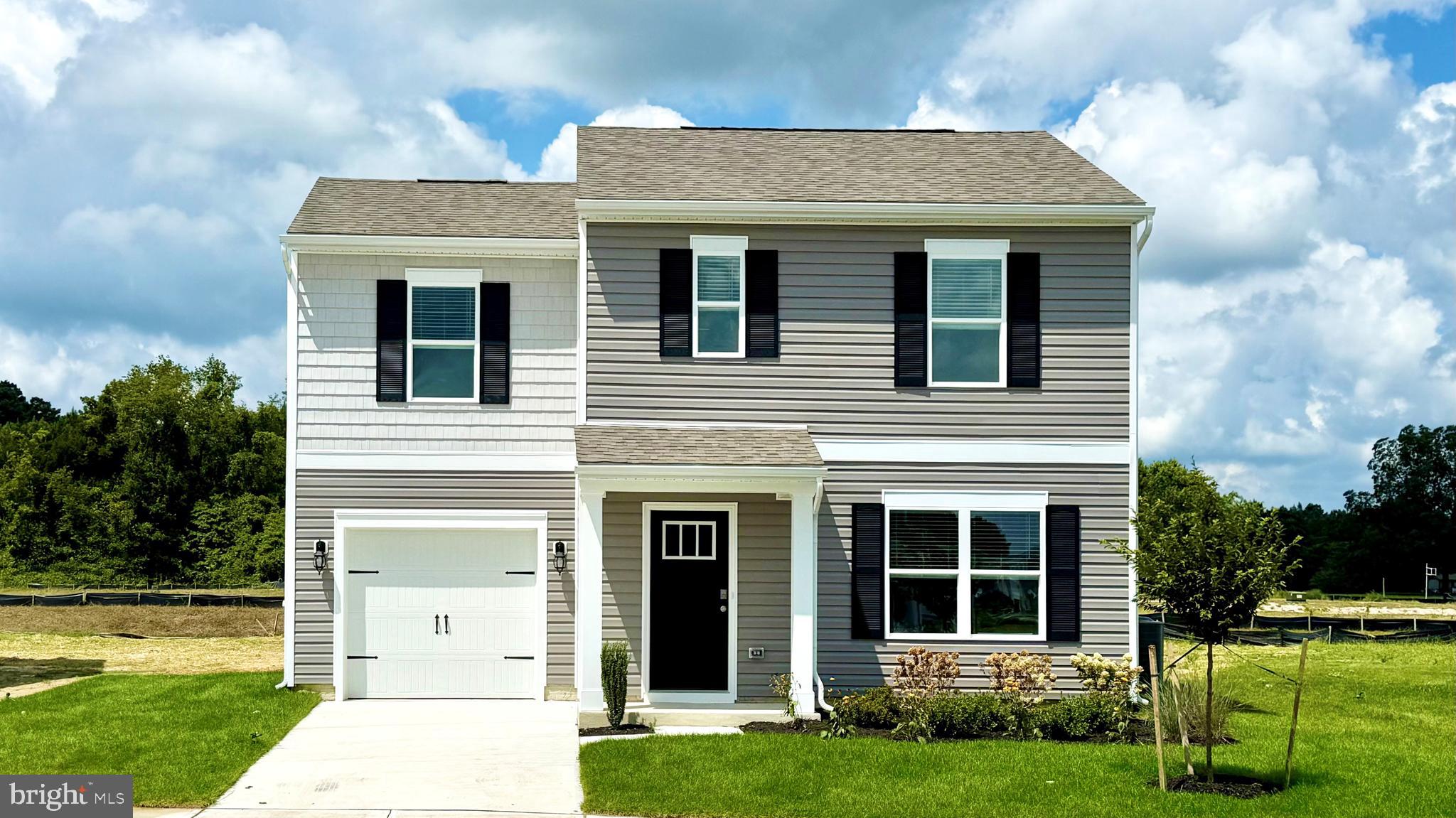 Discover 1313 Fairview Lane, a new home currently under construction in Heritage Trace featuring a spacious backyard in the heart of Salisbury, MD. The Essex is a cozy two-story home with three spacious bedrooms, two-and-a-half bathrooms, and a one-car garage.
This 1,333 square foot inviting home gives you the features that you need and the space that you desire. As you enter from the front porch, the foyer leads you to the sizeable family room with an abundance of natural light.
The open-concept floorplan allows the family room to flow easily into the eat-in kitchen. The functional kitchen features an L-shaped counter with granite countertops, stainless steel appliances and a pantry along with a sliding glass door for easy access to the backyard. The powder room is conveniently located near the one-car garage and coat closet.
The owner's suite is a quiet retreat featuring a walk-in closet and a private, full bath with a walk-in shower. Continuing down the hallway, the two additional well-sized bedrooms, each with plenty of closet space, a hall bathroom, and a linen closet are all located upstairs. The convenient laundry closet is also upstairs.
The home includes white window treatments and the innovative America’s Smart-Home® package that will give you complete peace of mind.
Pictures, artist renderings, photographs, colors, features, and sizes are for illustration purposes only and will vary from the homes as built. Image representative of plan only and may vary as built. Images are of model home and include custom design features that may not be available in other homes. Furnishings and decorative items not included with home purchase.