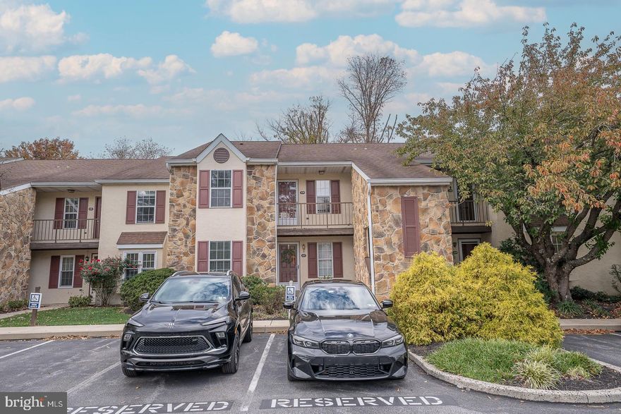 Welcome to Valley Stream Village in Chesterbrook! This bright and spacious 2-bedroom, 2-bathroom townhome offers 1,433 square feet of comfortable living in the award-winning Tredyffrin-Easttown School District. Beautiful hardwood floors flow seamlessly from the dining area to the expansive living room, highlighted by a wood-burning fireplace and sliding doors to a private balcony—perfect for relaxing or entertaining. The eat-in kitchen features stainless steel appliances, granite countertops, a tile backsplash, and abundant cabinet and counter space. The primary bedroom suite offers a walk-in closet, full ensuite bathroom, and a second set of sliders to the balcony, bringing in natural light and fresh air. A second bedroom, full hall bath with tub, laundry closet, a pull down attic for additional storage, complete this well-maintained home. Enjoy low-maintenance living in a prime Chesterbrook location, just minutes to major roadways, King of Prussia, and Gateway Shopping Center.